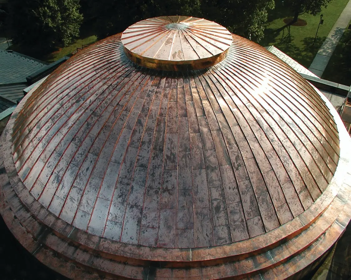 Craftsman Roofing crew installing a new roof in North Pepperell